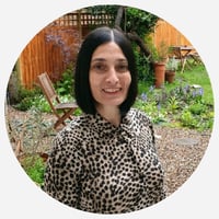 Taahra Ghazi headshot - grey background Taahra Ghazi headshot - grey background