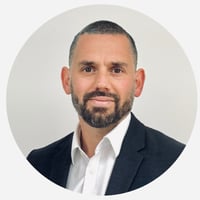 Tom McNeil headshot circle Tom McNeil headshot circle